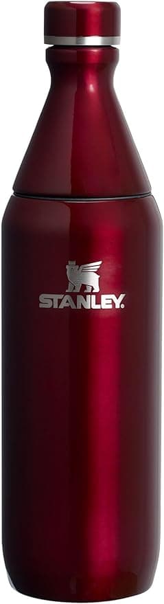 Stanley All Day Slim Bottle 20 oz | Twist off Lid with Leakproof Seal | Slim Design for Travel and Gym | Insulated Stainless Steel Water Bottle | BPA-Free | Garnet Shine